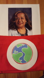picture of Wendy Ellison with an image of a globe