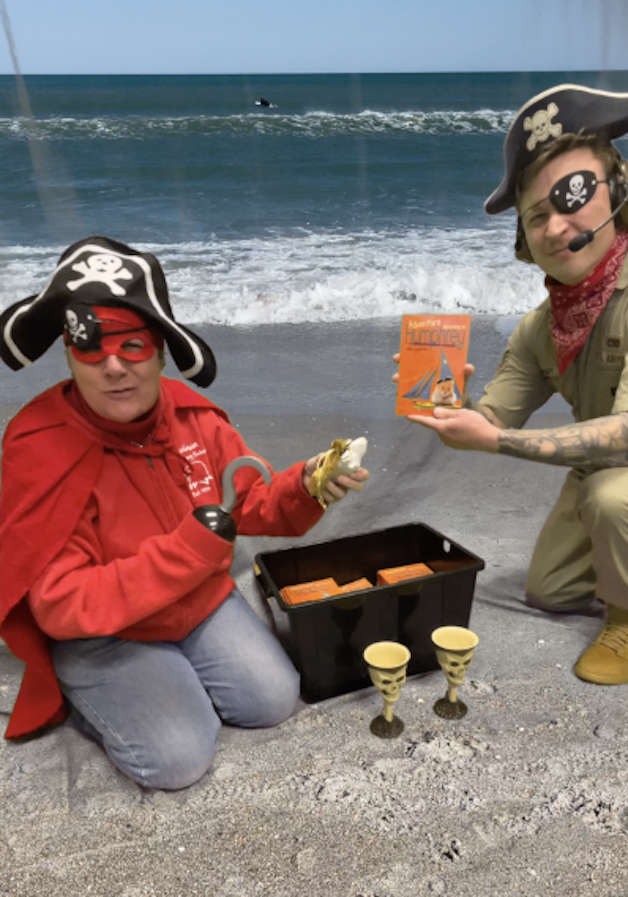 Treasure chest with pirates holding the book: Adventure According to Humphrey